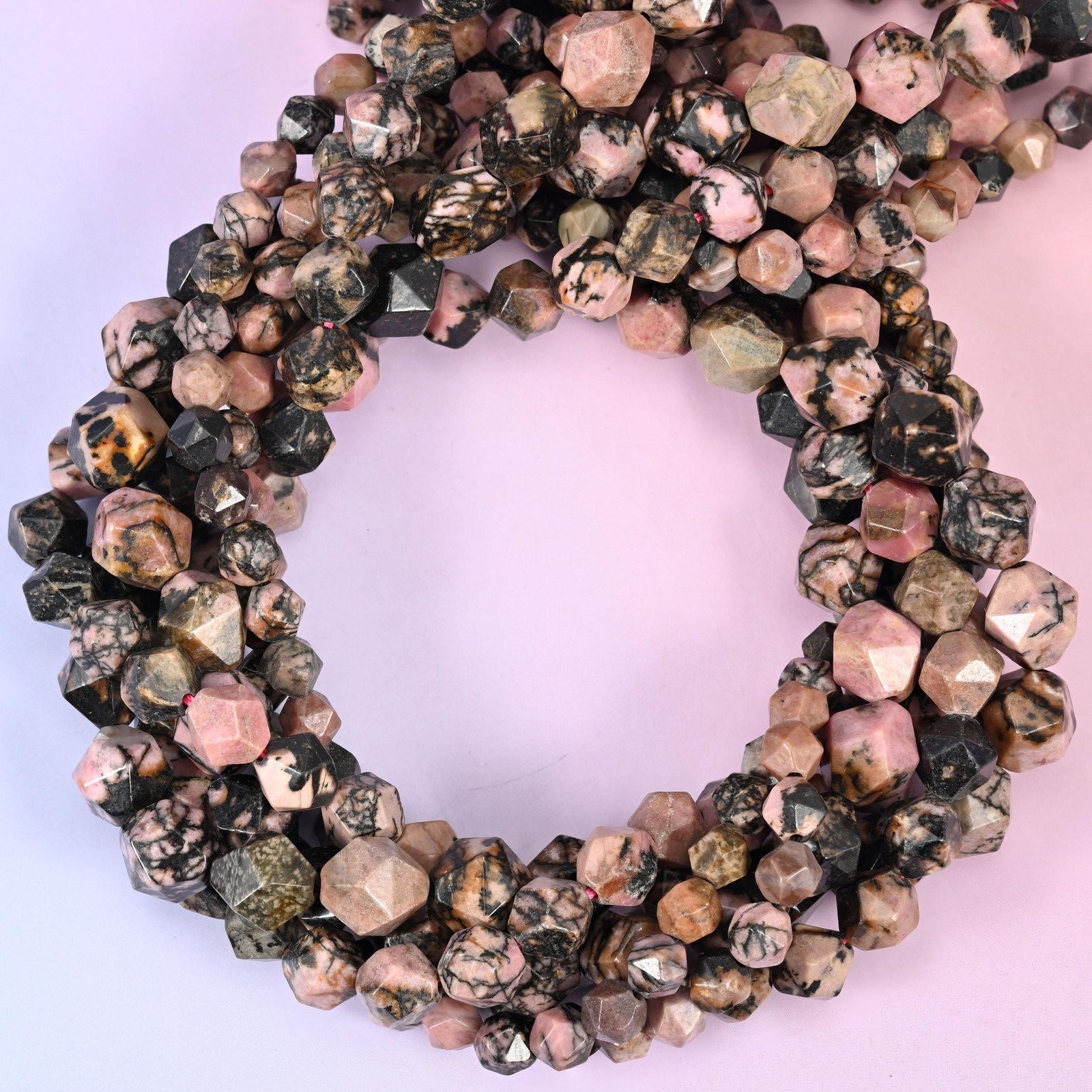 Rhodonite Beads: Faceted Diamond Star Cut, 6-10mm, 15.5 inch Strand
