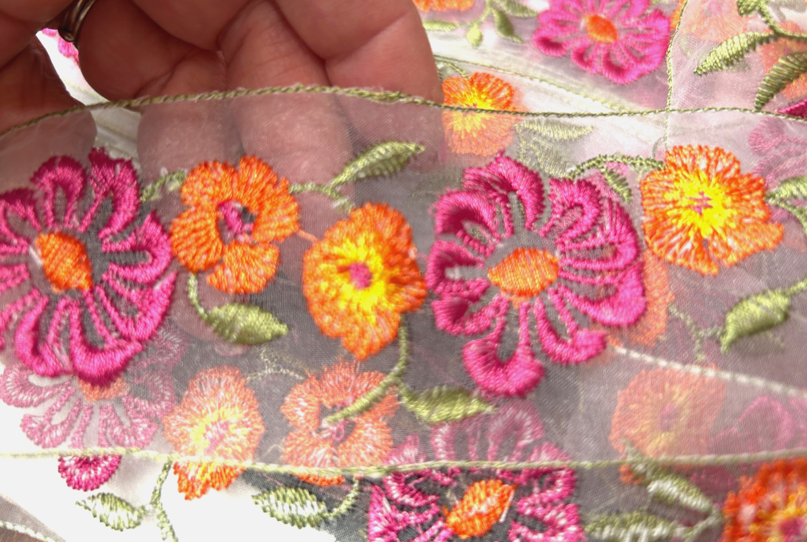 embroidered sheer flowers 2″ as pictured 1yd