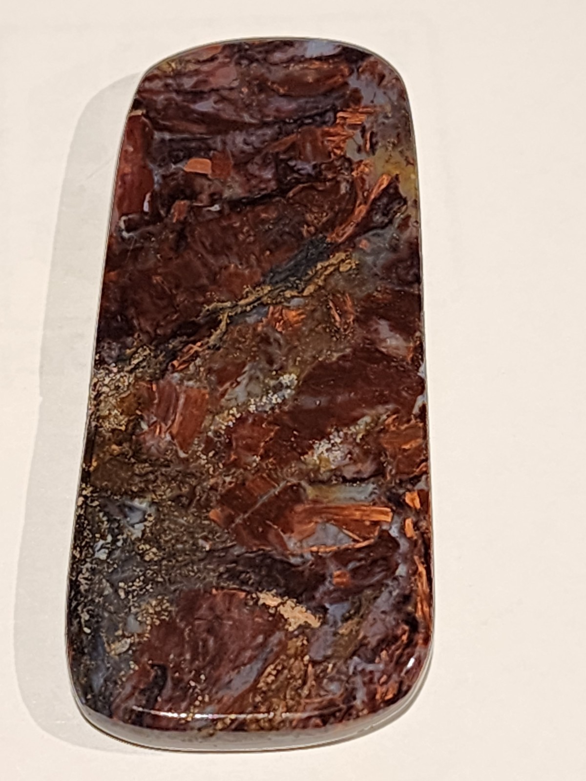 Pietersite chatoyant polished natural fire specimen, 180 carat
