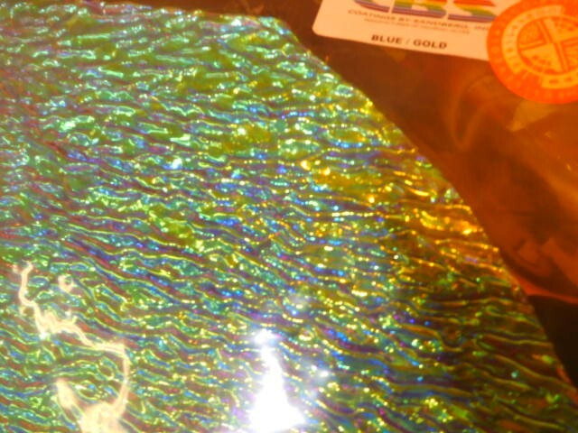 Dichroic Glass:CBS 90COE Blue/Gold on Granite Ripple Textured Clear- 3″ Sq