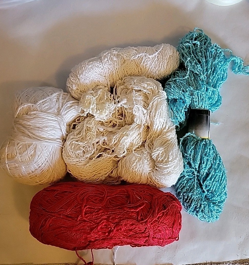Lot of 7 Cotton Blend Yarns In White, Aqua Blue &Red. About 12 Oz In Bag