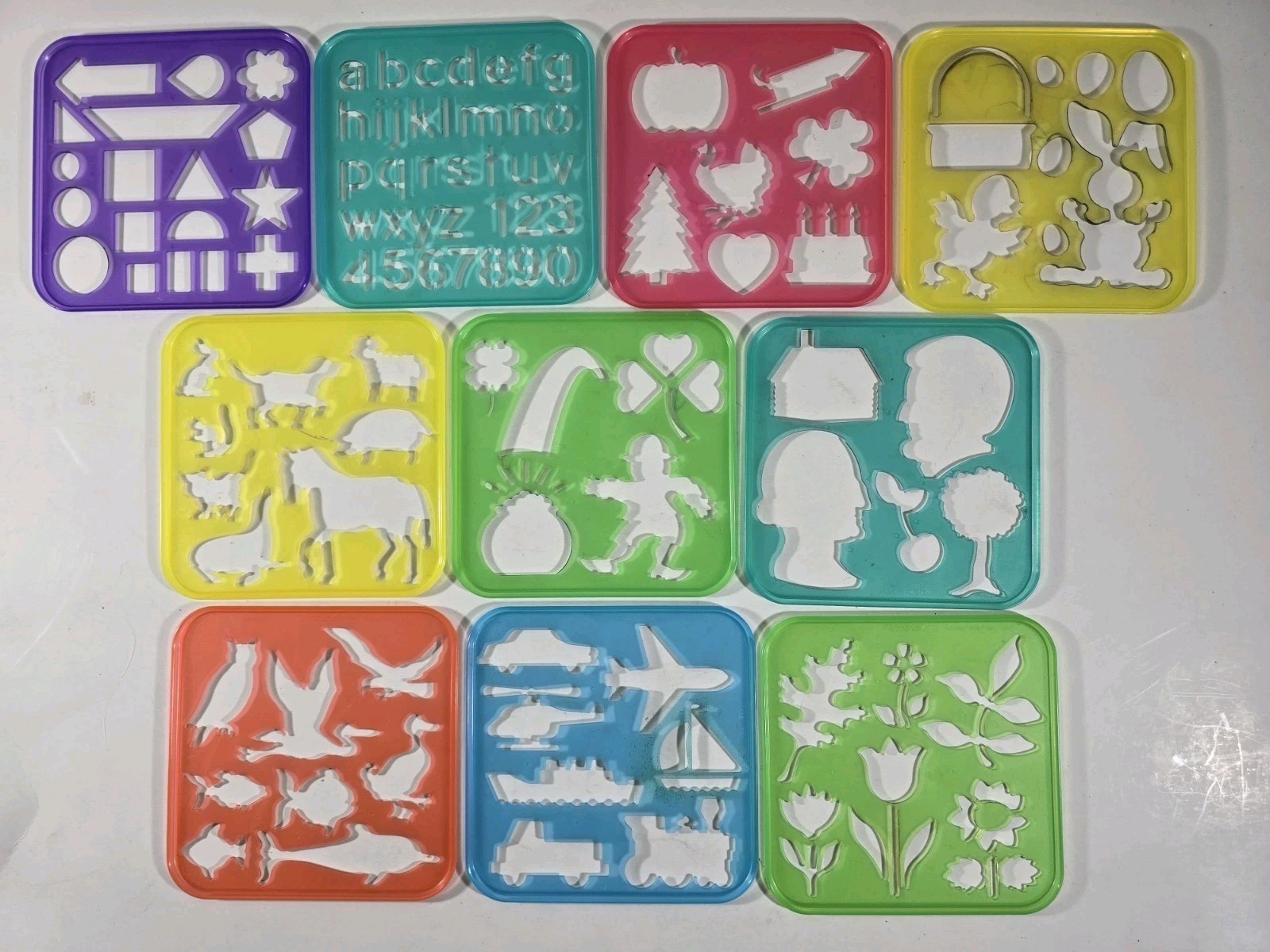 Lot of 10 Vintage Tupperware TupperToys Stencils Letters Transportation Plants