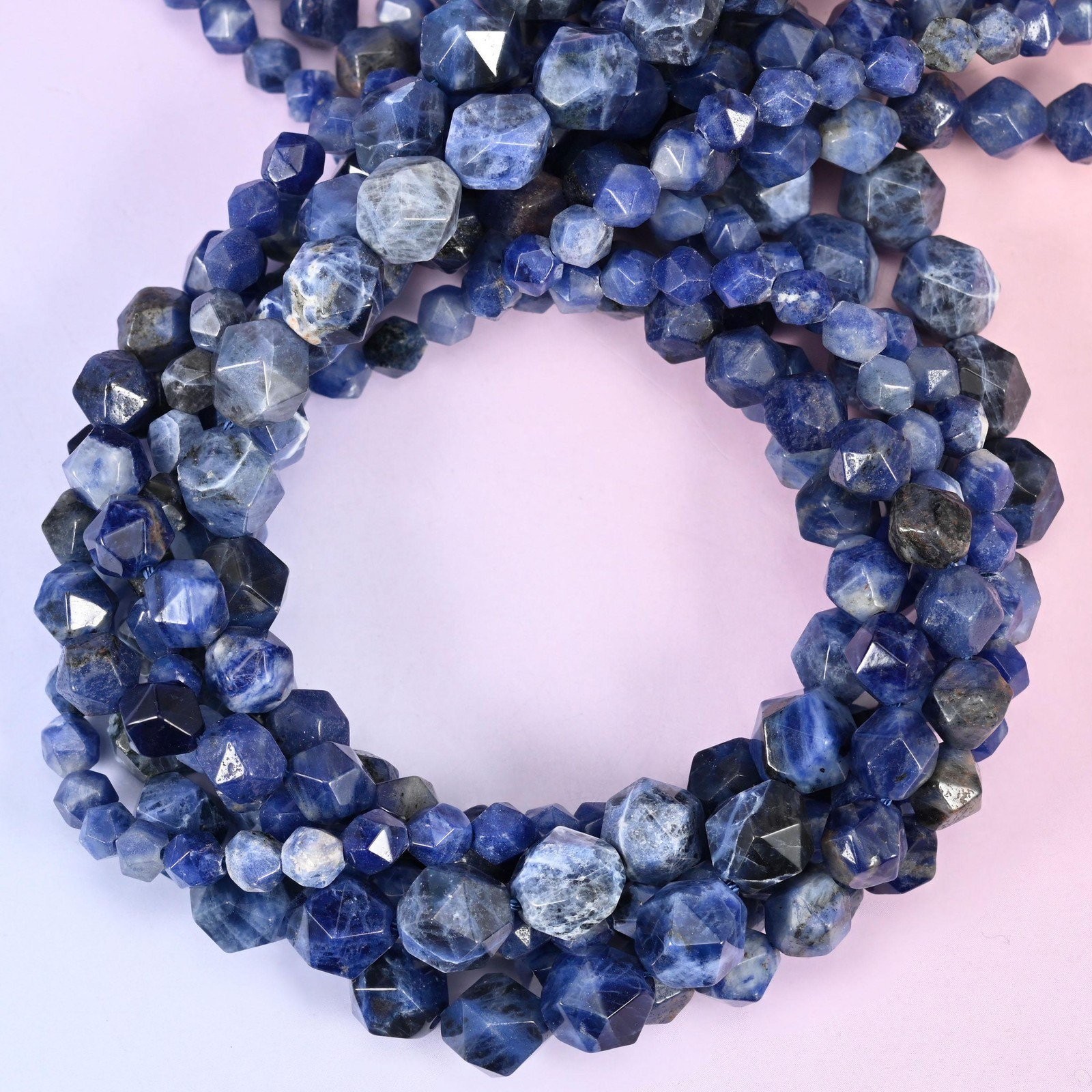 Blue Sodalite Beads: Faceted Diamond Star Cut, 6-10mm, 15.5 inch Strand