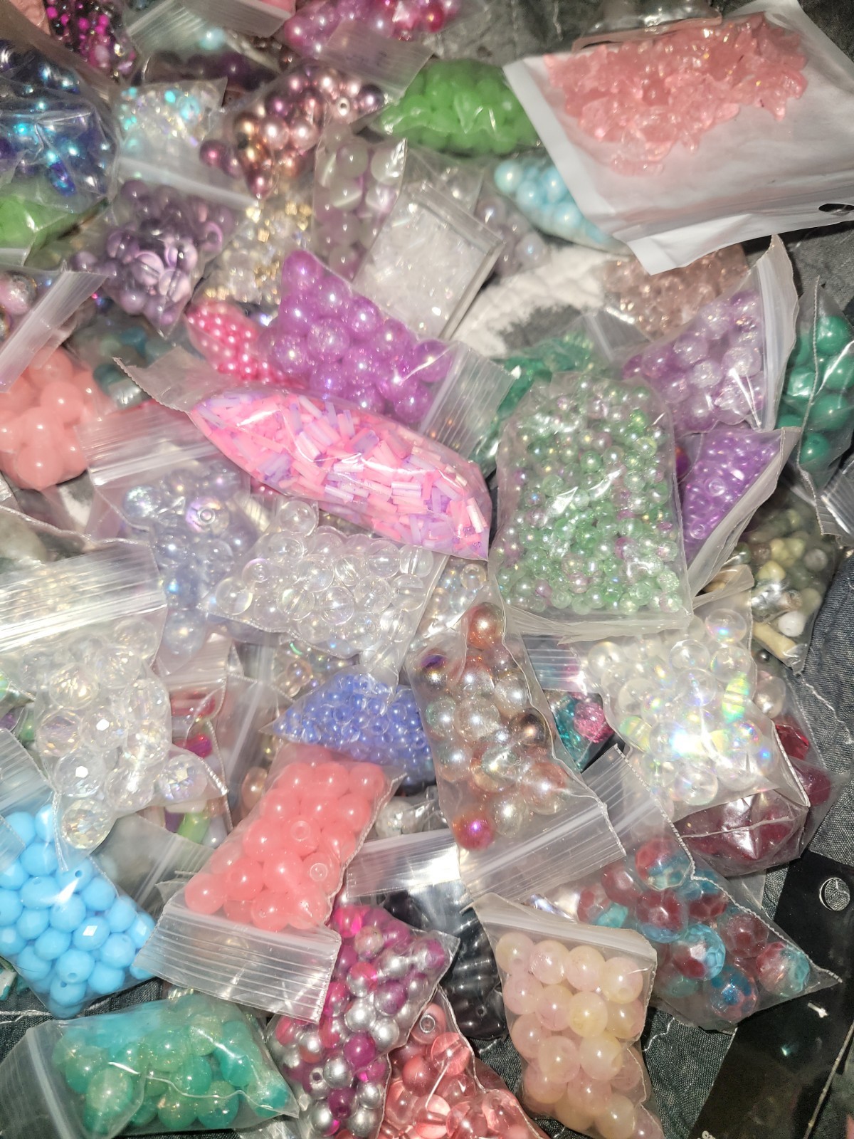100 bags of Loose Glass Beads of all shapes sizes and colors