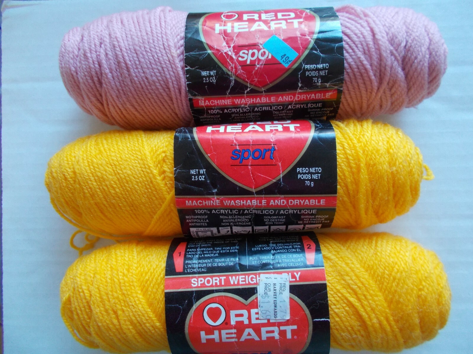 Red Heart Sport yarn, mixed lot of 3 (yellow/pale rose) – 2.5 oz each