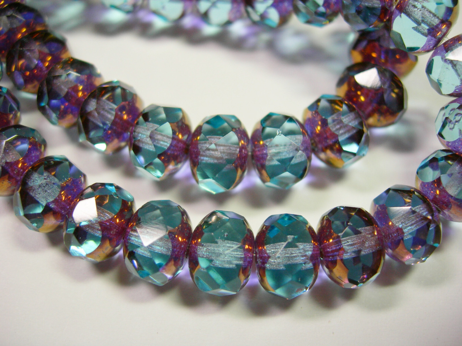 25 8x6mm Sapphire Blue with Bronze Czech Fire polished Rondelle beads