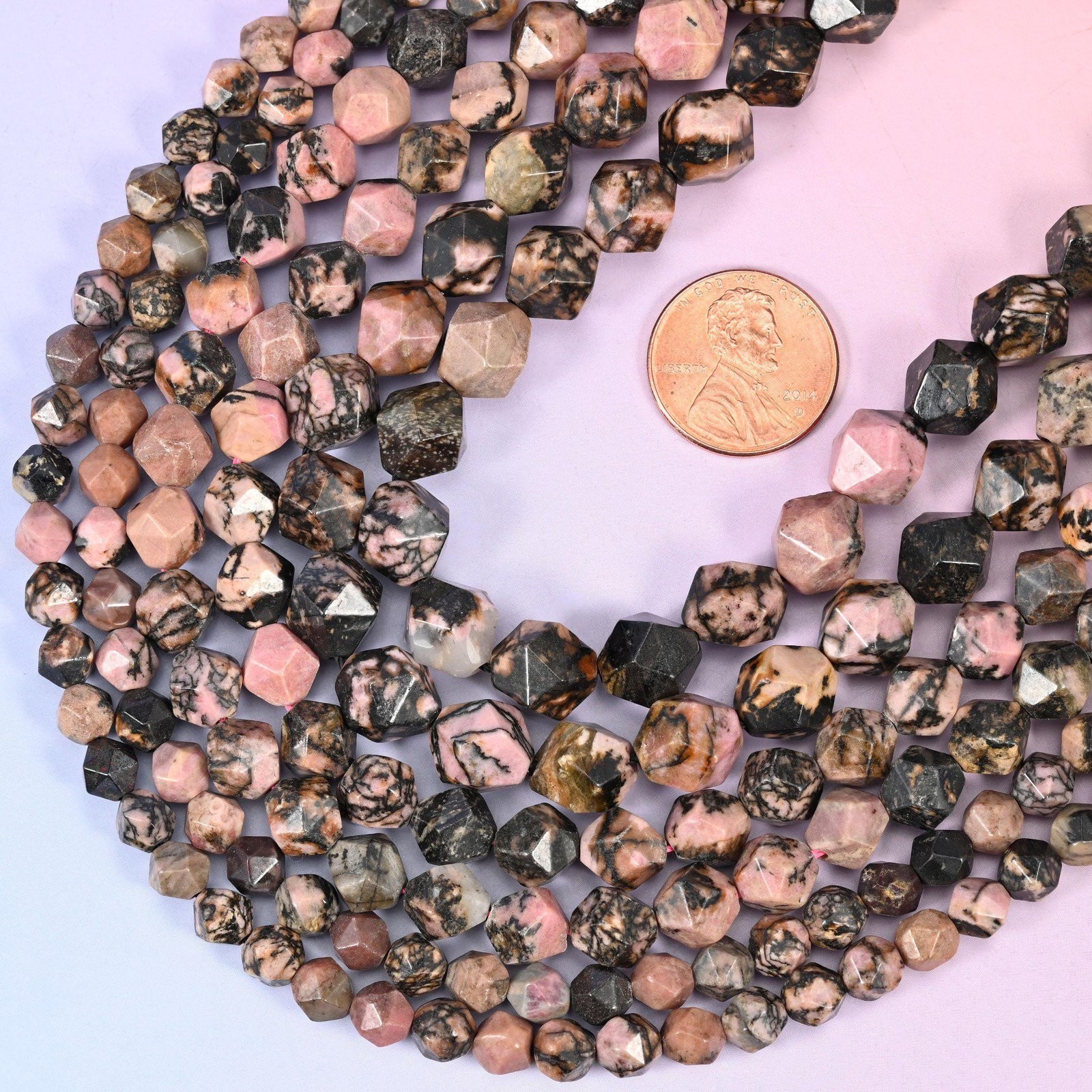 Rhodonite Beads: Faceted Diamond Star Cut, 6-10mm, 15.5 inch Strand