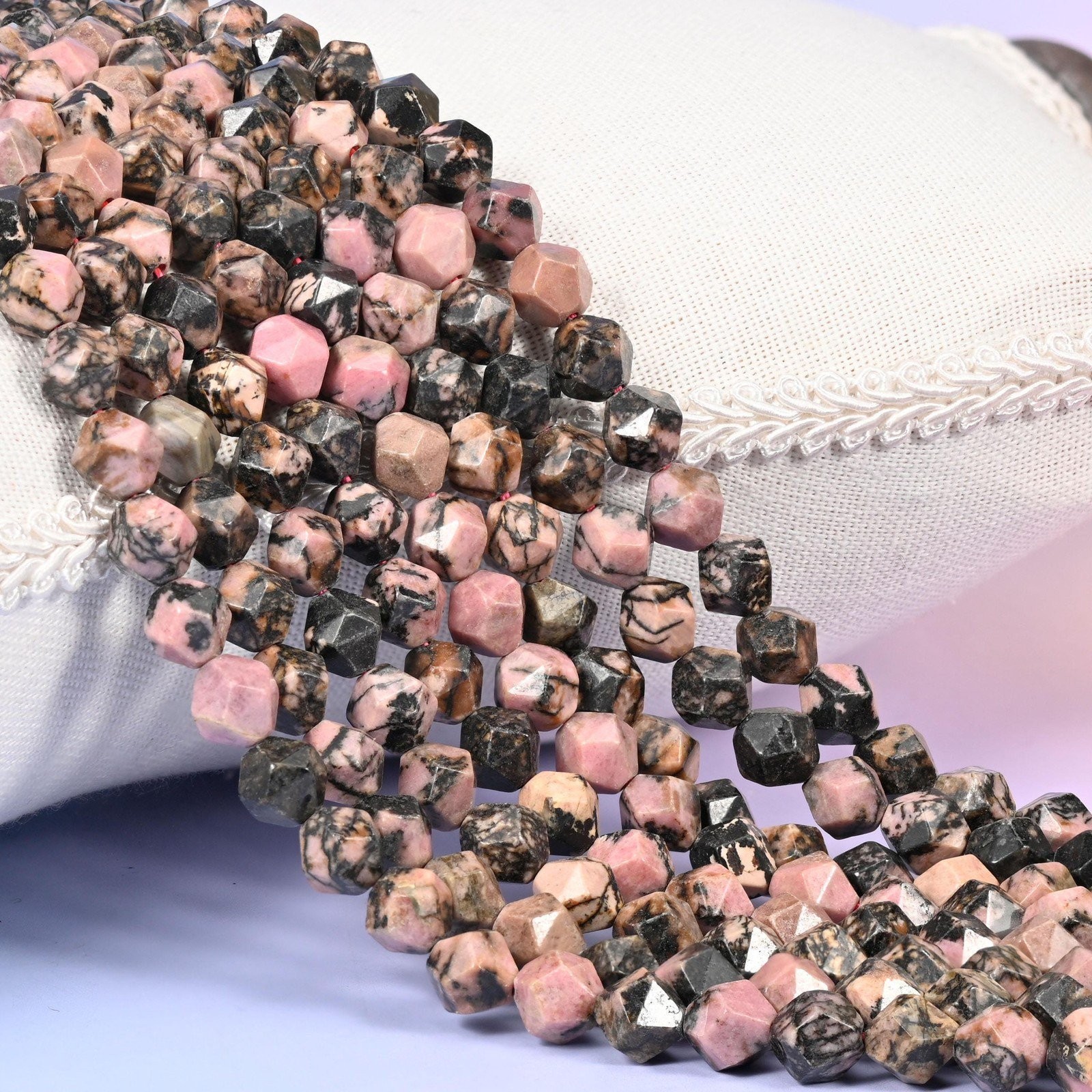 Rhodonite Beads: Faceted Diamond Star Cut, 6-10mm, 15.5 inch Strand