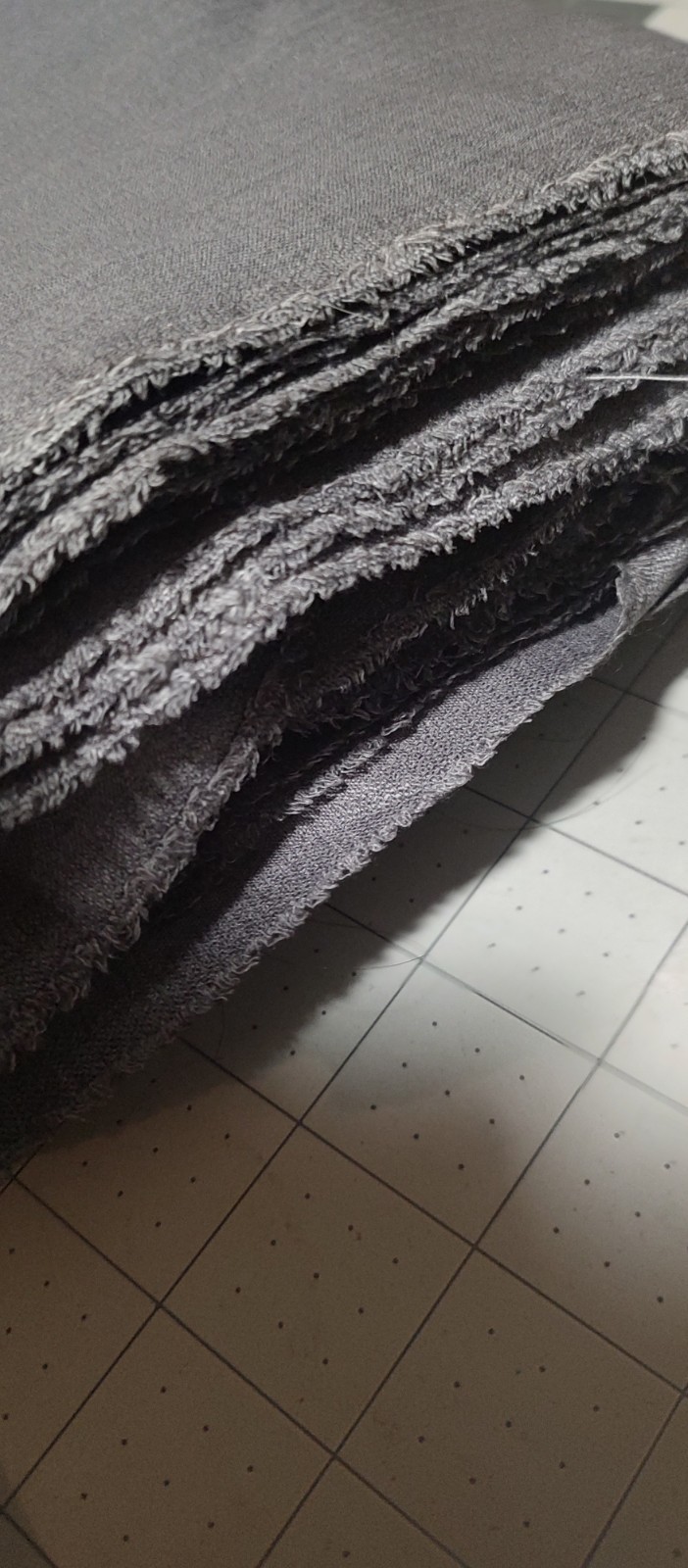Gray Polyester Lightwieght Suiting Fabric. 13 yards x 54″ 7 pounds