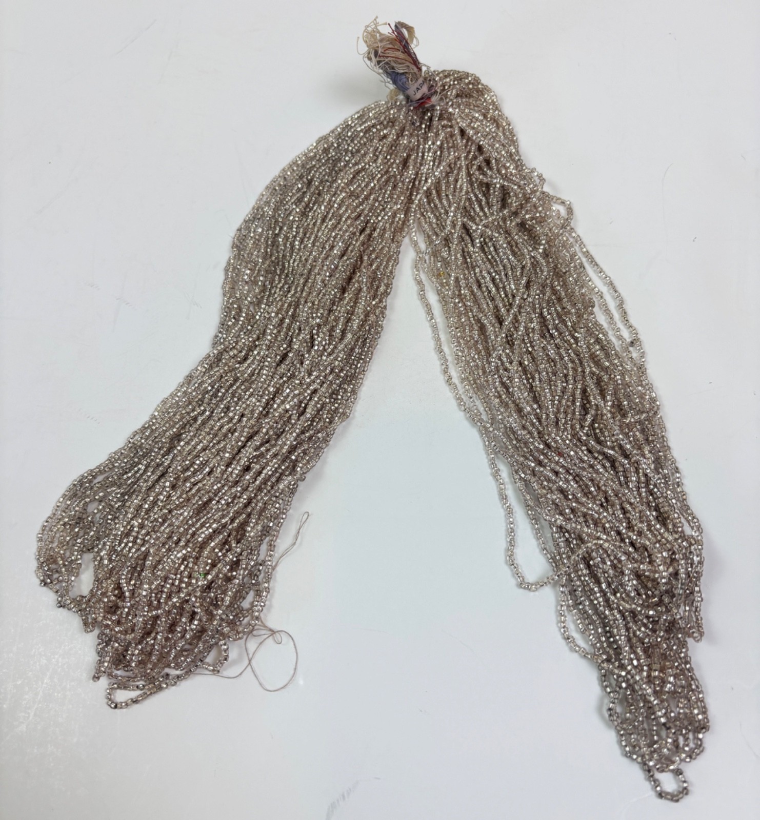 Vintage Hank of Metallic Silver Seed Beads Marked Japan
