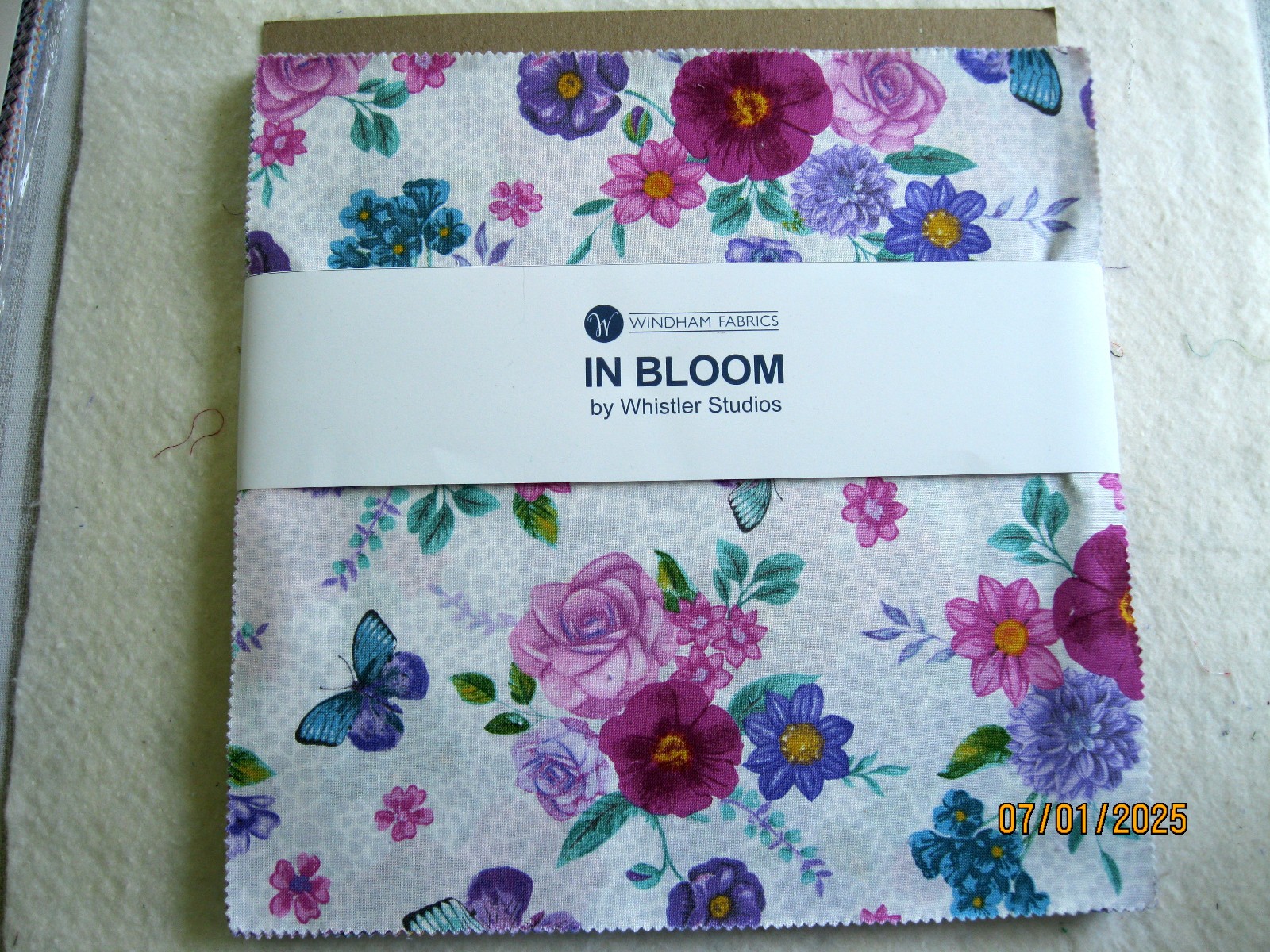 Windham Fabrics In Bloom – layer cake 10″ square, 42 pcs.