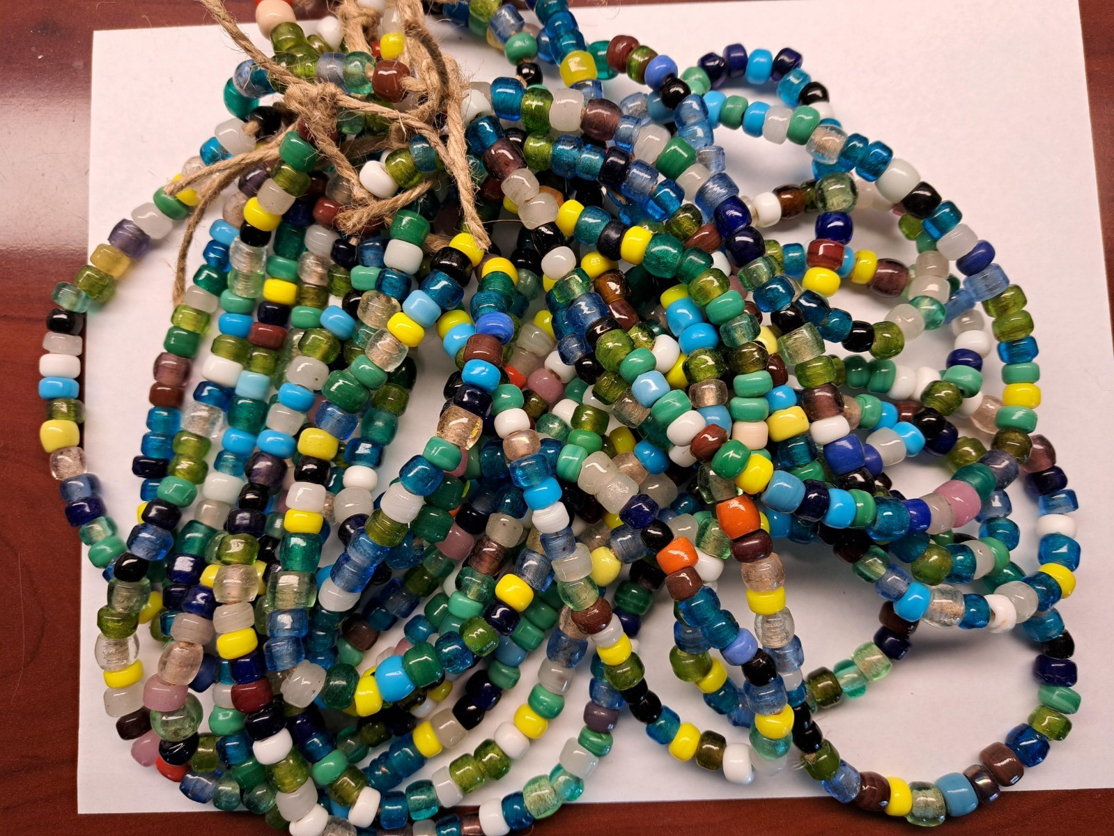 2 strands of 100 large hole, various color beads 8-9mm, hole size 3mm.