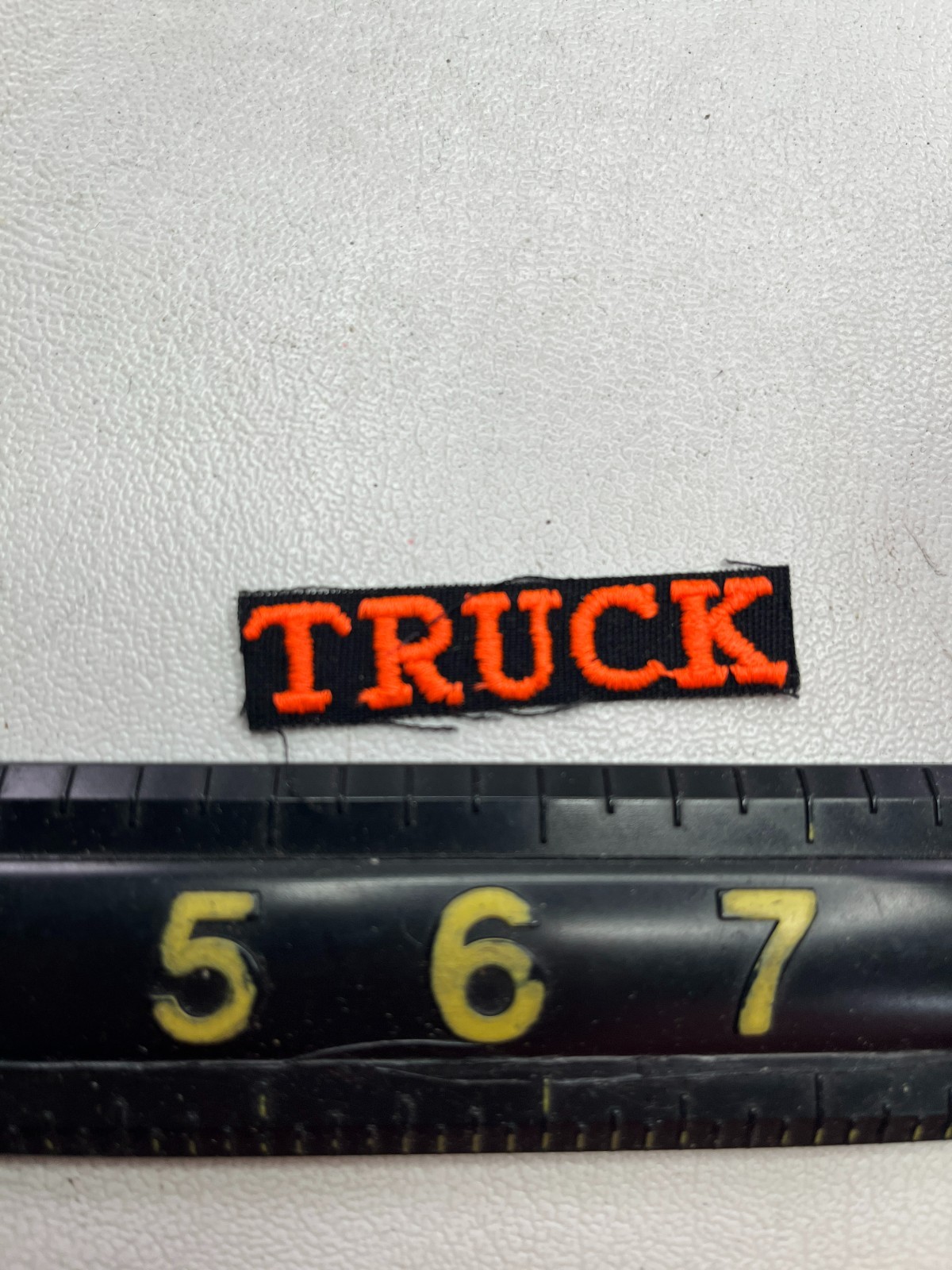 Very Small Size Letter Embroidered In Orange TRUCK Patch T171
